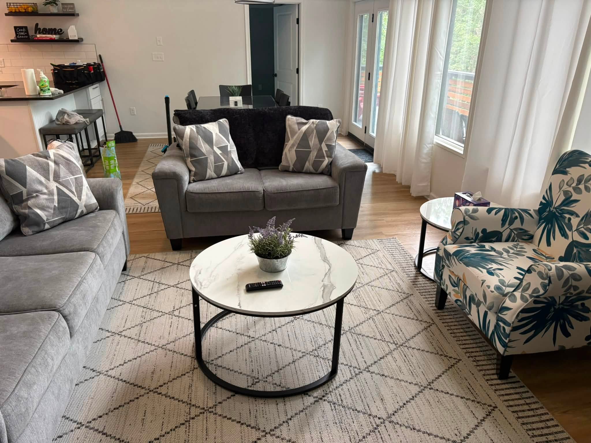 A freshly cleaned living room by Holy Shine Cleaning Co